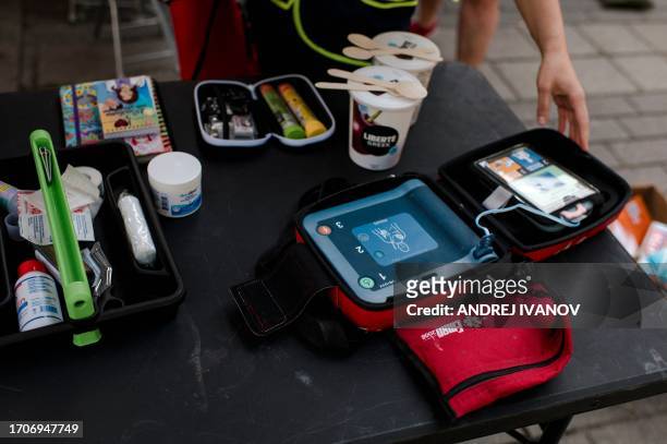 Bettina, a nurse working at the Salvation Army mobile health clinic, shows the defibrillator she can use in case of emergency in Montreal, Quebec,...