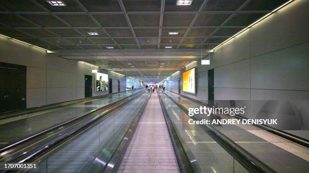 escalated walkway. subway. airport. - airport mockup stock pictures, royalty-free photos & images