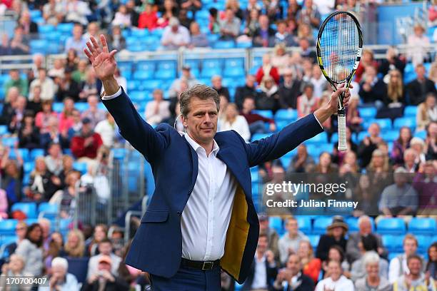 Andrew Castle in action during the Rally Against Cancer charity match on day seven of the AEGON Championships at Queens Club on June16, 2013 in...