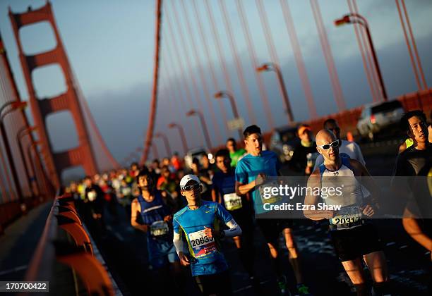 Runners cross the Golden Gate Bridge during the 2013 San Francisco Marathon and Half-Marathon on June 16, 2013 in San Francisco, California.