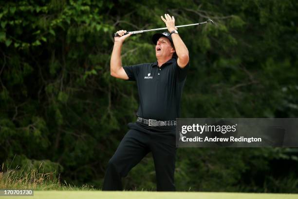 Phil Mickelson of the United States reacts after chipping to the second green during the final round of the 113th U.S. Open at Merion Golf Club on...