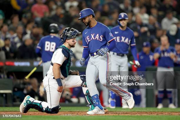 Leody Taveras of the Texas Rangers celebrates his solo home run during the third inning against the Seattle Mariners at T-Mobile Park on September...