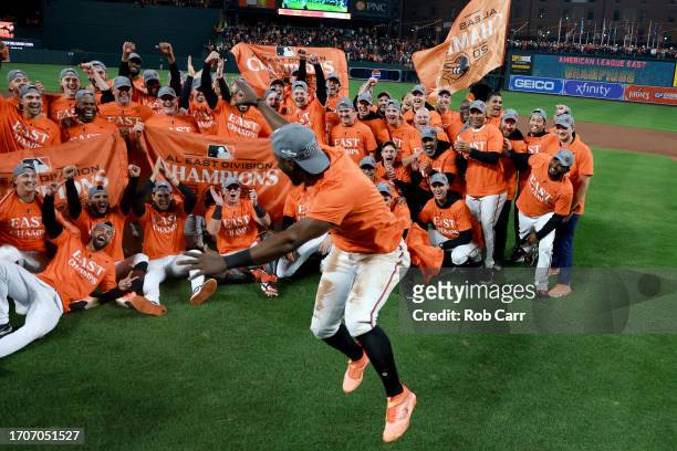 Jorge Mateo of the Baltimore Orioles celebrates with the team while posing for a group photo after the Orioles defeated the Boston Red Sox to win the...