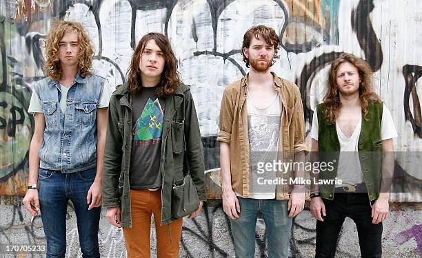 Musicians Samuel Shea, Matt Stevenson, Jack Collins and Ethan Snyder of Spires pose prior to performing during the 2013 Northside Festival at the...