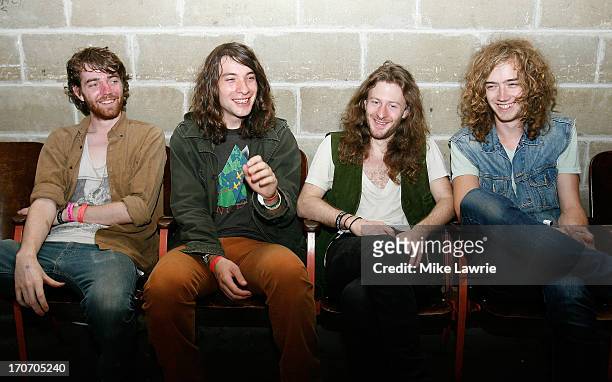 Musicians Jack Collins, Matt Stevenson, Ethan Snyder and Samuel Shea of Spires pose prior to performing during the 2013 Northside Festival at the...