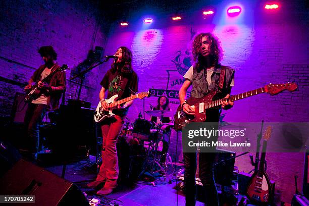 Musicians Jack Collins, Ethan Snyder, Matt Stevenson and Samuel Shea of Spires perform during the 2013 Northside Festival at the Jameson Black Barrel...