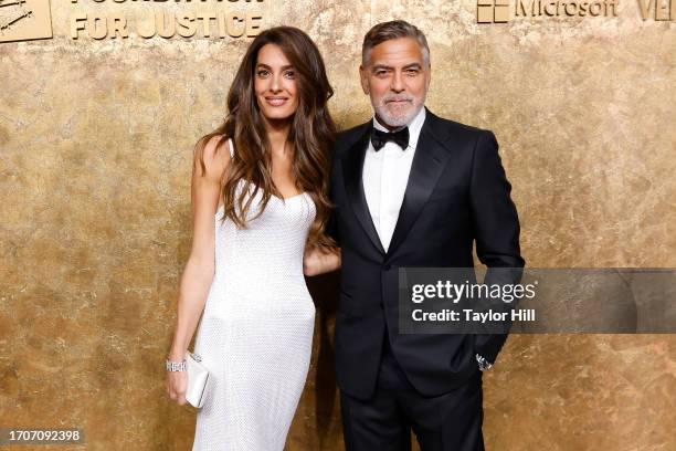 Amal Clooney and George Clooney attend the Clooney Foundation for Justice's 2023 Albie Awards at New York Public Library on September 28, 2023 in New...