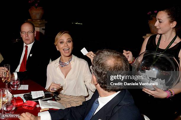 Prince Albert II of Monaco and Ornella Muti attend Taormina Filmfest and Prince Albert II Of Monaco Foundation Gala Dinner at on June 16, 2013 in...