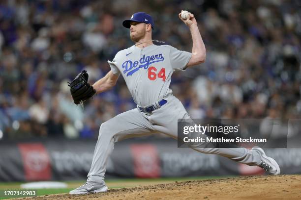 Pitcher Caleb Ferguson of the Los Angeles Dodgers throws against the Colorado Rockies in the seventh inning at Coors Field on September 28, 2023 in...