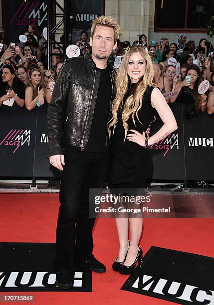 Chad Kroeger and Avril Lavigne arrives at the 2013 MuchMusic Video Awards at MuchMusic HQ on June 16, 2013 in Toronto, Canada.