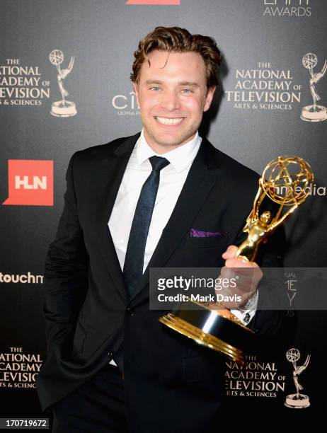Actor Billy Miller poses with the Outstanding Supporting Actor in a Drama Series award for "The Young and the Restless" in the press room during The...