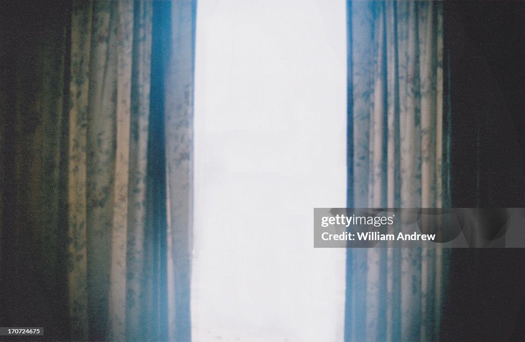 Light rays through vintage curtains