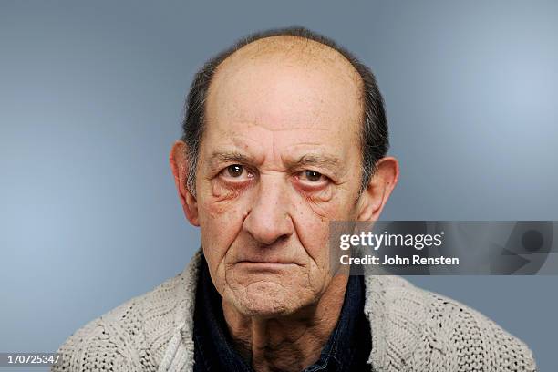 happy and grumpy old men - homme triste photos et images de collection