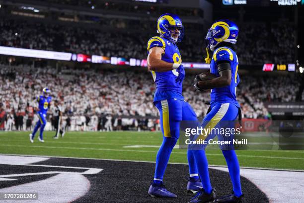 Tutu Atwell of the Los Angeles Rams celebrates with Tyler Higbee during at Paycor Stadium on September 25, 2023 in Cincinnati, Ohio.