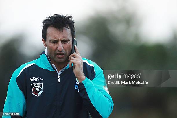 Laurie Daley talks on the phone during a Born To Be Blue Clinic at Coogee Oval on June 17, 2013 in Sydney, Australia.