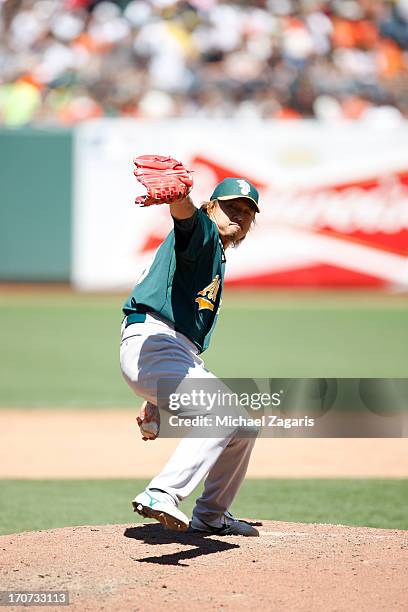Hideki Okajima of the Oakland Athletics pitches during the game against the San Francisco Giants at AT&T Park on May 30, 2013 in San Francisco,...