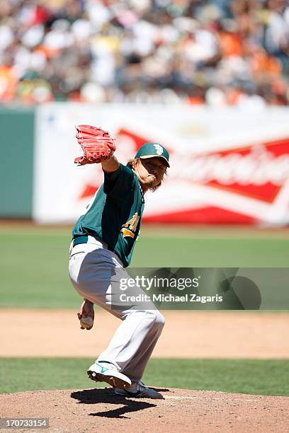 Hideki Okajima of the Oakland Athletics pitches during the game against the San Francisco Giants at AT&T Park on May 30, 2013 in San Francisco,...