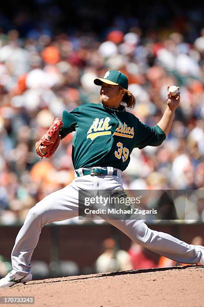 Hideki Okajima of the Oakland Athletics pitches during the game against the San Francisco Giants at AT&T Park on May 30, 2013 in San Francisco,...