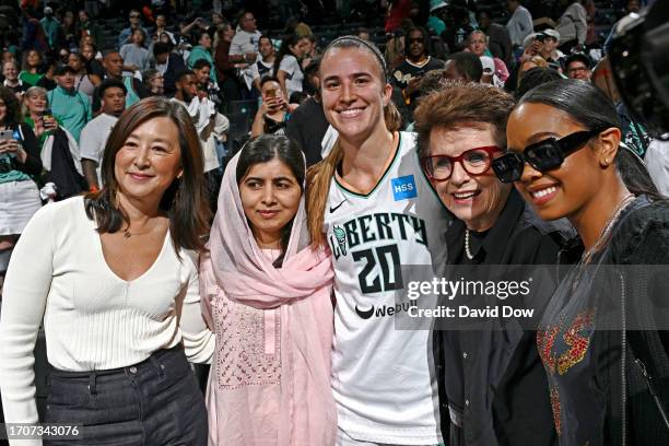 Sabrina Ionescu of the New York Liberty, Billie Jean King, Malala Yousafzai and HER pose for a photo after round one game one of the 2023 WNBA...