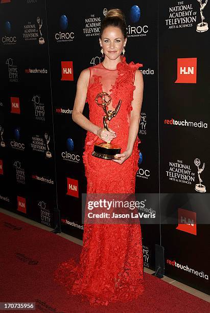 Actress Julie Marie Berman poses in the press room at the 40th annual Daytime Emmy Awards at The Beverly Hilton Hotel on June 16, 2013 in Beverly...