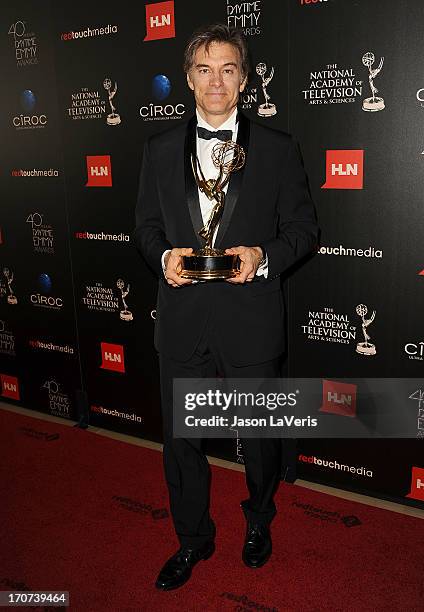 Dr. Mehmet Oz poses in the press room at the 40th annual Daytime Emmy Awards at The Beverly Hilton Hotel on June 16, 2013 in Beverly Hills,...