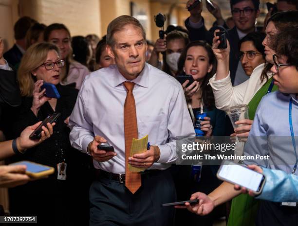 Rep. Jim Jordan makes his way through a gauntlet of reporters as he makes his way towards a GOP leadership meeting at the Capitol in the wake of the...