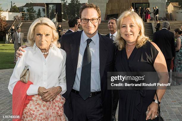 Micheline Maus, her son Pierre-Andre Maus and Florence Rogers-Pinault attend the dinner of Conseil des Grand Crus Classes of 1855 hosted by Chateau...