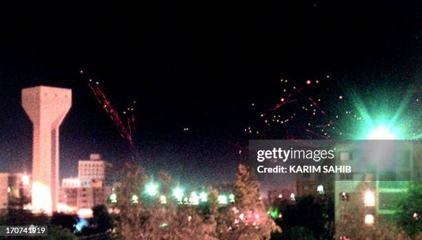 Red traces of anti-aircraft machine gun fire sear across Baghdad's skyline during the last raid 19 December. After four consecutive nights of air...
