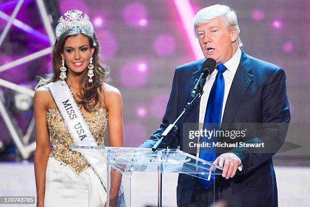 Miss Connecticut USA Erin Brady and Donald Trump onstage after winning the 2013 Miss USA pageant at PH Live at Planet Hollywood Resort & Casino on...