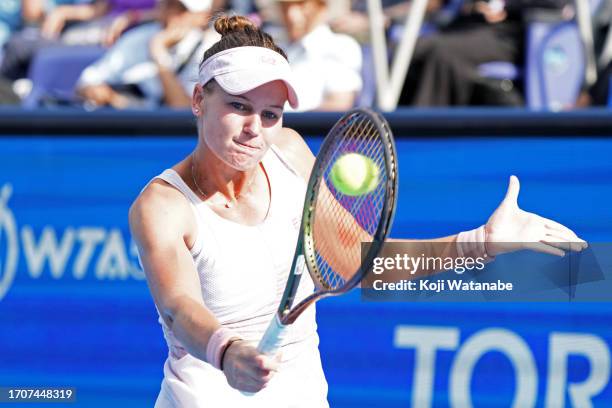 Veronika Kudermetova returns a shot in her match against Iga Swiatek in the Quarter finals round on day five of the Toray Pan Pacific Open at Ariake...
