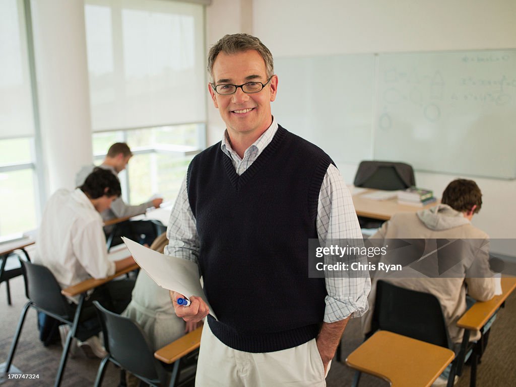 Smiling professor in classroom