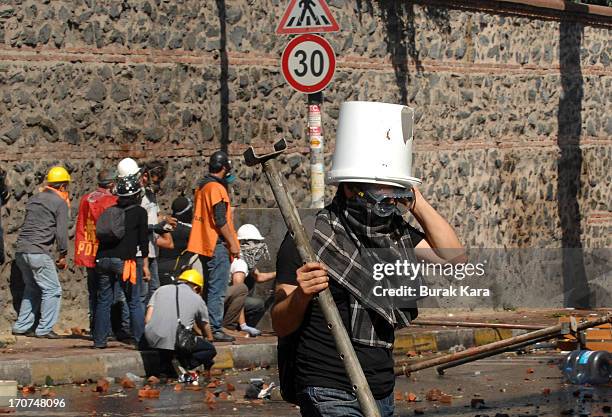 Anti-government protestors wear protective clothing during clashes with police in Kurtulus district on June 16, 2013 in Istanbul, Turkey. Protests...