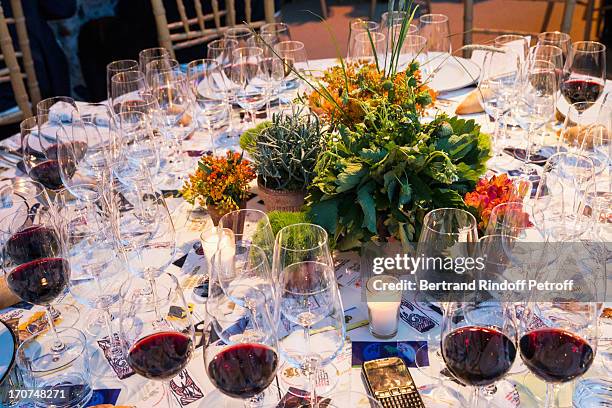 View of table decorations during the dinner of Conseil des Grand Crus Classes of 1855 hosted by Chateau Mouton Rothschild on June 16, 2013 in...