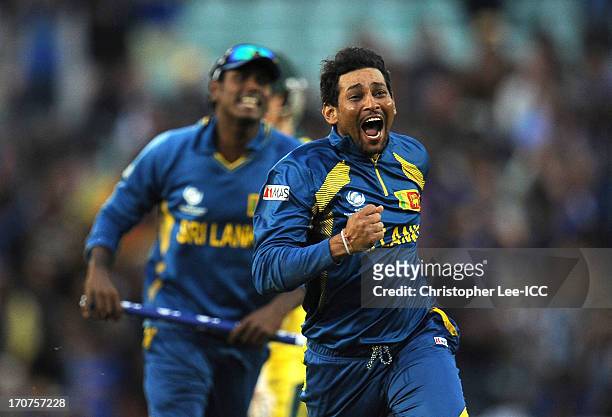 Tillakaratne Dilshan of Sri Lanka celebrates taking the final wicket of Clint McKay of Australia and winning the match during the ICC Champions...