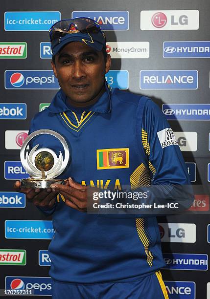 Mahela Jayawardene of Sri Lanka poses for the camera with his Man of the Match award during the ICC Champions Trophy Group A match between Sri Lanka...