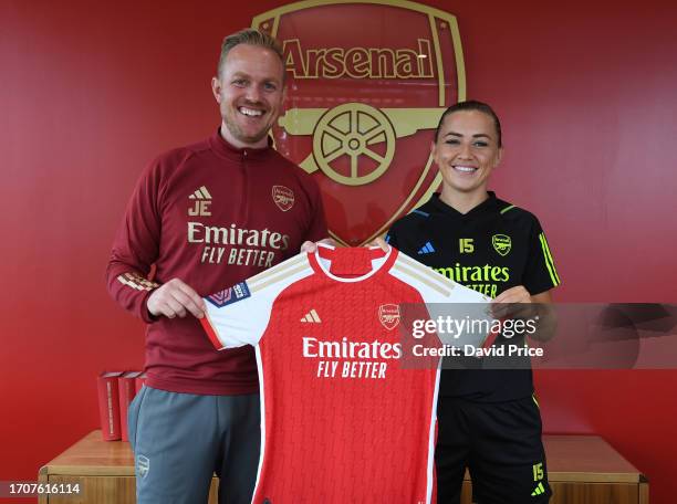 Katie McCabe signs a new contract for Arsenal with Arsenal Women's Head Coach Jonas Eidevall at the Arsenal Training ground at London Colney on...
