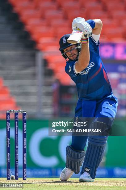 England's Joe Root plays a shot during the 2023 ICC men's cricket World Cup one-day international match between England and New Zealand at the...