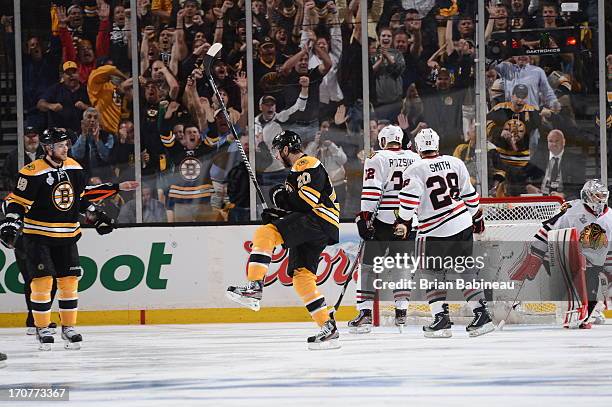 Daniel Paille of the Boston Bruins scores a goal against the Chicago Blackhawks in Game Three of the Stanley Cup Final at TD Garden on June 17, 2013...