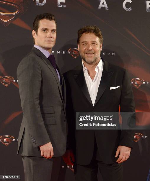 Henry Cavill and Russell Crowe attend the premiere of ' Man of Steel' at Capitol Cinema on June 17, 2013 in Madrid, Spain.