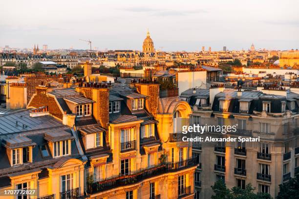 paris rooftops at sunset, high angle view, france - paris street stock pictures, royalty-free photos & images