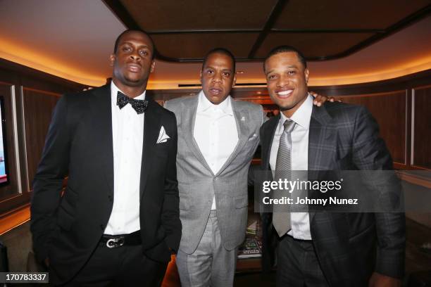 Geno Smith, Jay-Z and Robinson Cano attend The 40/40 Club 10 Year Anniversary Party at 40 / 40 Club on June 17, 2013 in New York City.