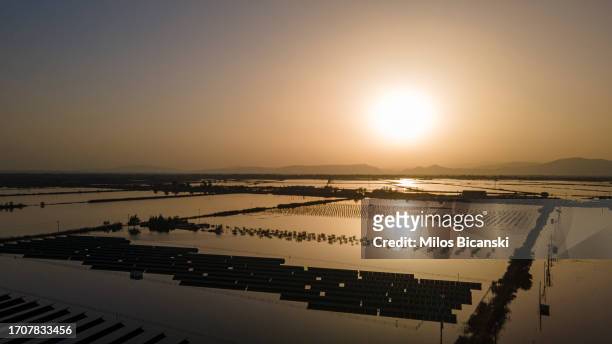 Solar panels and olive trees surrounded by floodwater following Storm Daniel, on September 25, 2023 near to Larissa, Trikala region, Greece. Storm...