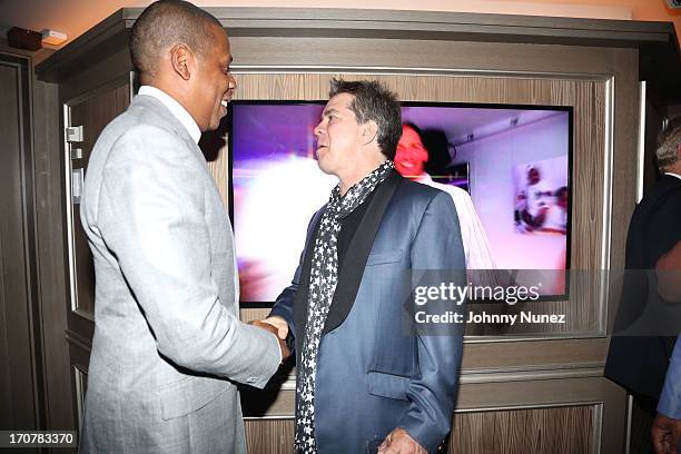 Jay-Z and Andy Hilfiger attend The 40/40 Club 10 Year Anniversary Party at 40 / 40 Club on June 17, 2013 in New York City.