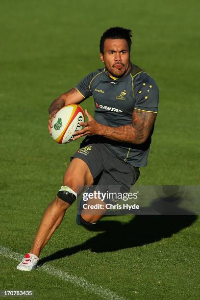 Digby Ioane runs the ball during an Australian Wallabies training session at Ballymore Stadium on June 18, 2013 in Brisbane, Australia.