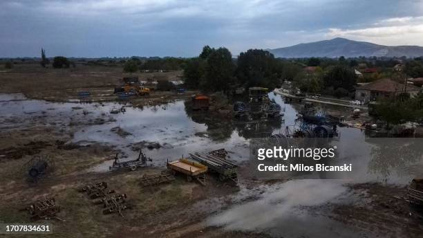 Agriculture machines laid outside a flooded fields in the village of Psatochori, which had disappeared beneath floodwaters as impact of storm Daniel...
