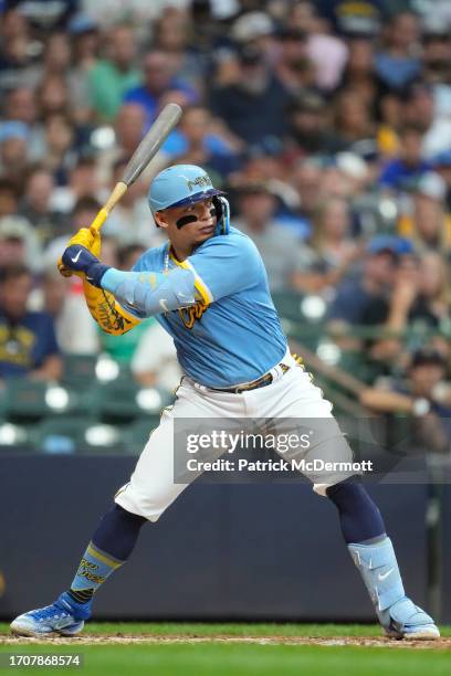 William Contreras of the Milwaukee Brewers bats in the second inning against the Pittsburgh Pirates at American Family Field on August 04, 2023 in...