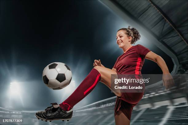 female soccer woman player in a fictional football stadium - world cup netherlands stock pictures, royalty-free photos & images