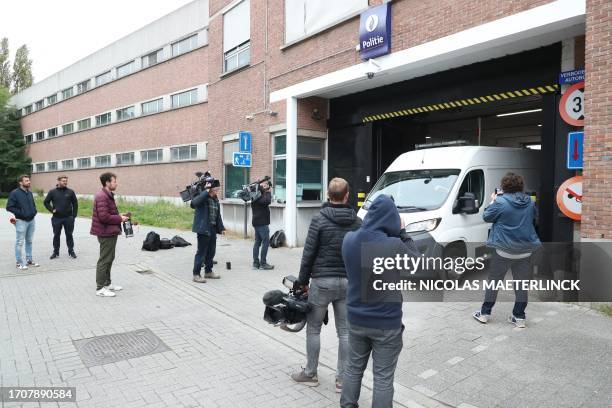 Illustration shows the pers waiting outside in marge of an interrogation with the police regarding racist comments he allegedly made to police...