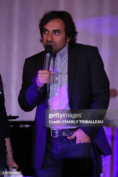 Le compositeur et musicien et homme de télévision français d'origine arménienne, André Manoukian s'exprime, le 23 avril 2010 à Paris, avant un...
