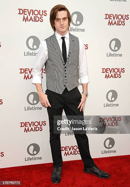 Actor Eddie Hassell attends the premiere of "Devious Maids" at Bel-Air Bay Club on June 17, 2013 in Beverly Hills, California.